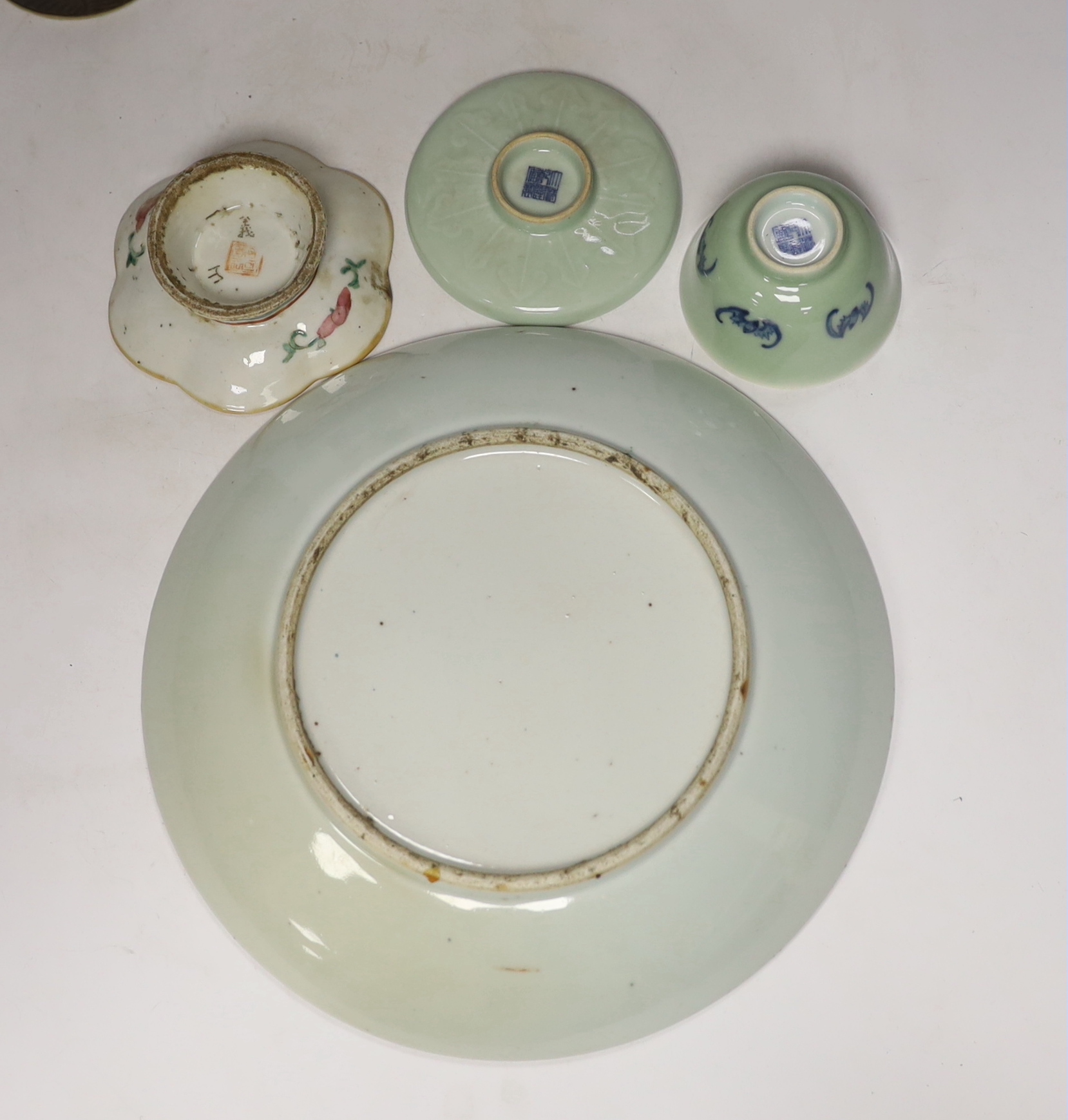 Five Chinese porcelain items including a blue and white crackle glaze cylindrical vase and a celadon glaze tea bowl and stand, largest 29cm in diameter